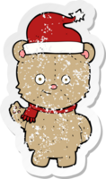 retro distressed sticker of a cartoon christmas teddy bear png