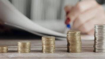 Close up of coins with hands woman 4K Background video