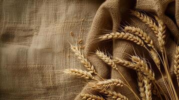 AI generated ears of wheat on a burlap background. place for text photo