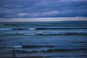 Stormy sea in the evening. Baltic sea, Poland, Europe. photo