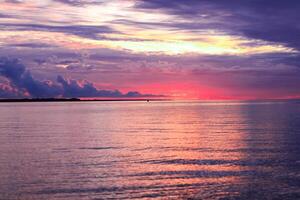 Beautiful sunset over the sea. Colorful sky at sunset. photo