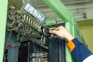 industrial worker at the work in factory photo