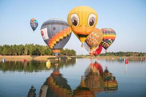 Chiang Rai, Thailand - February-14-2024 - International ballon fiesta 2024 festival in Singha park, Chiang Rai. This event is the year to experience giant balloons up close in Thailand. photo