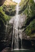 Beautiful view of Madakaripura waterfalls the tallest waterfalls in Java island and second tallest waterfalls in Indonesia. photo