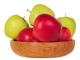 Red and green apples in a wooden bowl isolate on white. Healthy food, apples. photo