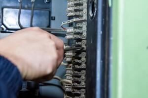 industrial worker at the work in factory photo