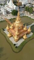 Golden Buddhist Temple In Chiang Rai Aerial video