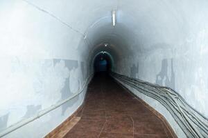 old tunnel way, abandoned tunnel in the secret factory photo