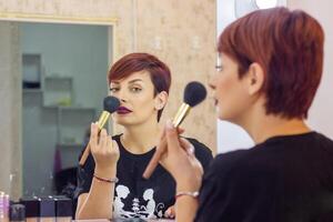 pretty young woman in spa salon photo