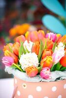 Colorful Flower Bouquet in Polka Dot Vase photo