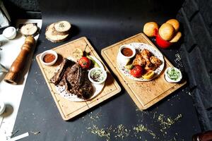 Two Plates of Food on a Table photo