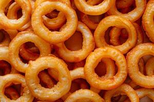 AI generated Golden Crispy Onion Rings Close-Up. photo