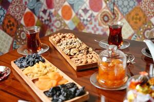 Wooden Table With Assorted Food Trays photo