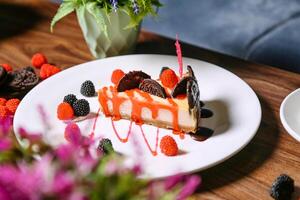 Cheesecake Slice With Berries on a Plate photo