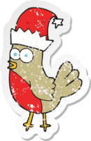 retro distressed sticker of a cartoon robin in christmas hat png