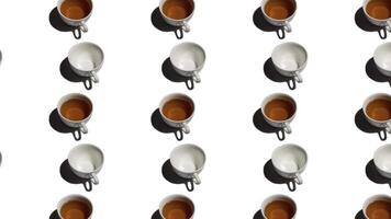 Pattern with many tea cups and empty cups animated on white background. Tea mugs with hot drink move in different directions. 4K video