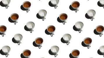 Pattern with many tea cups and empty cups animated on white background. Tea mugs with hot drink move in different directions. 4K video