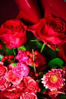 Bouquet of Red Roses and Flowers photo