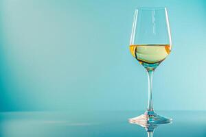 AI generated Elegant White Wine Glass on Blue Background with AI generated. photo