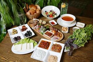 Delicious Meal Served on Wooden Table photo