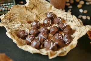 Close-Up of a Plate of Chocolates on a Table photo