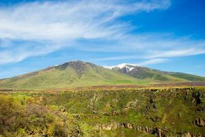 landscape with mountains and clouds, mountain landscape in the summer, landscape with mountains and blue sky photo