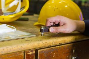 industrial worker at the workstation photo