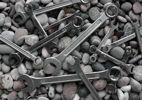 Different Iron Wrenches On A Sea Stones Black And White Stock Photo For Backgrounds