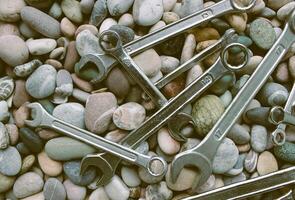 Steel Spanners On A Rocks In Old Film Style Stock Photo