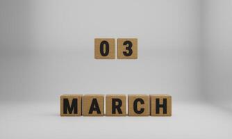 wooden cubes with arranged letters. March and 03 on blurry white background photo