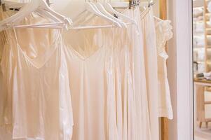 Chic Satin Dresses on Hangers photo