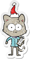 hand drawn distressed sticker cartoon of a surprised office worker cat wearing santa hat png