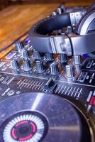close up of a dj mixer, dj control panel photo
