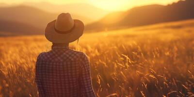 ai generado mujer disfrutando puesta de sol en dorado trigo campo foto