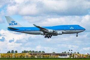 Amsterdam, Netherlands, 2014 - KLM Royal Dutch Airlines Boeing 747-400 PH-BFR passenger plane arrival and landing at Amsterdam Schipol Airport photo