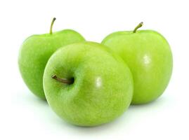 Green apples on white backgrounds photo