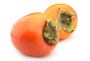 Persimmon on white backgrounds photo