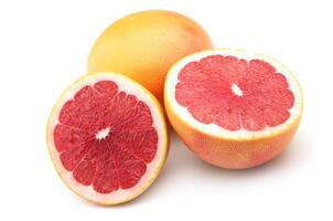 Ripe grapefruit on white backgrounds photo