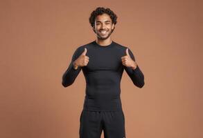 AI Generated A man in black thermal wear shows double thumbs up with a confident smile. photo