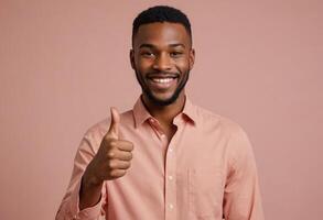 AI Generated A cheerful young man in a salmon pink shirt poses with a thumbs up, exuding confidence and happiness. The backdrop is plain and emphasizes the subject. photo
