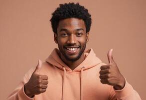 AI Generated A man with an afro in a peach hoodie giving double thumbs up with a cheerful expression. photo