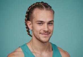 AI Generated A fit young man with braided hair and a sleeveless top stands before a blue background, exuding a casual and cool demeanor. photo