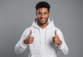 AI Generated Friendly man with curly hair in white hoodie giving double thumbs up. Engaging and joyful expression. photo