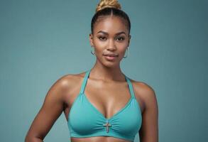 AI Generated Confident woman in a fitness top stands assertively, her sleek high ponytail exemplifying a strong attitude. Teal backdrop accentuates her presence. photo