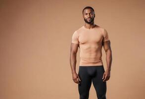 AI Generated A strong man stands confidently in a fitted peach shirt, his athletic build apparent. photo