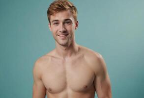 AI Generated A smiling man without a shirt exudes confidence and ease, standing against a teal background. photo