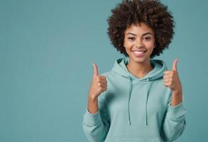 AI Generated A happy woman in a hoodie giving double thumbs up. Her joyful expression radiates happiness and casual style. photo