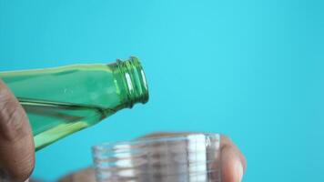 pouring soft drinks from bottle in a glass video