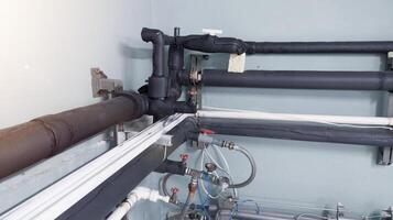 Cold water pipes in cooling machine installations in the hatchery industry. photo