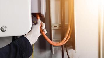 A engineering checking power cable lines in inverter solar panel. photo